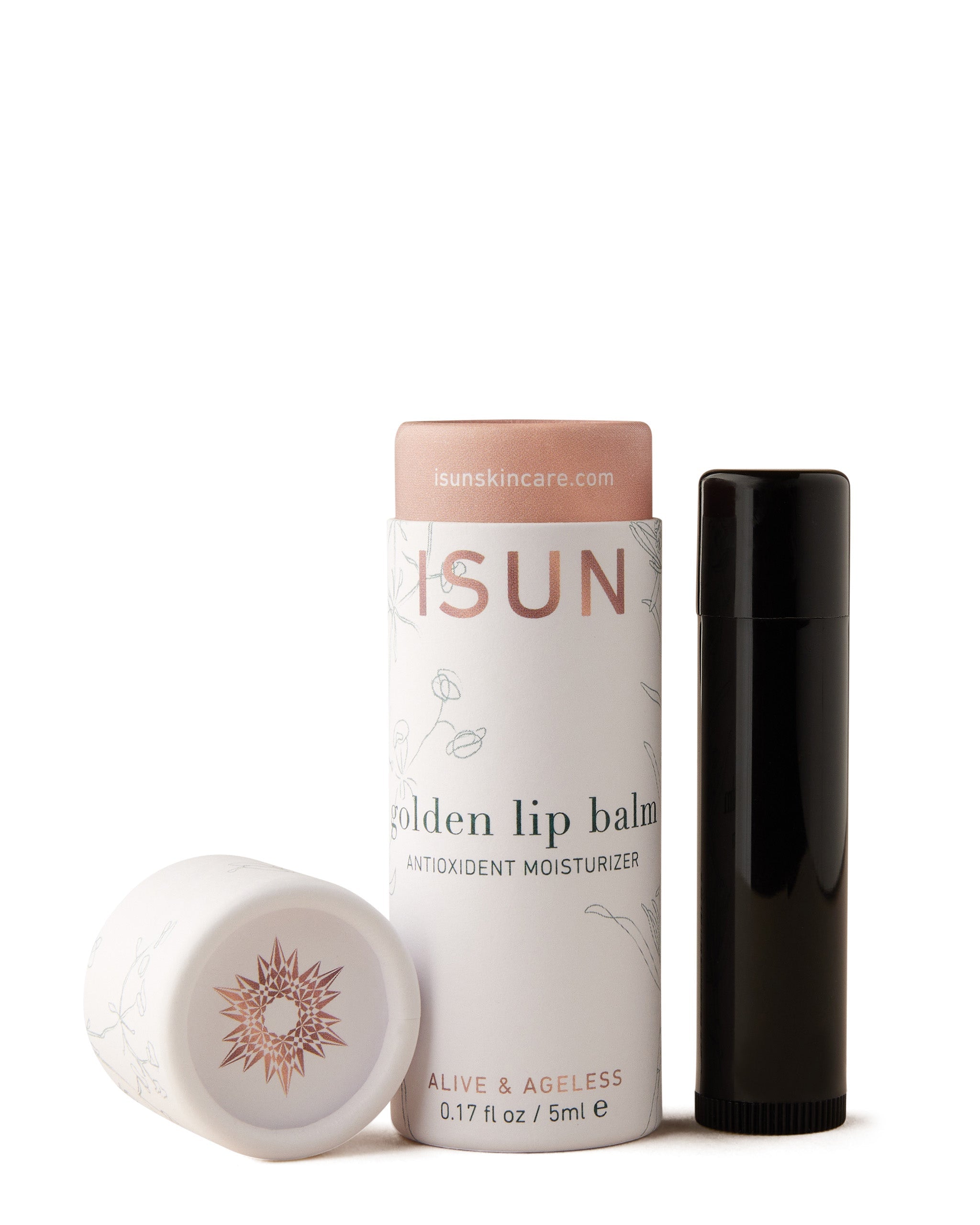 A tube of ISUN Golden Lip Balm next to its lid, with the balm visible outside the tube. The packaging is predominantly white and black with text and branding.