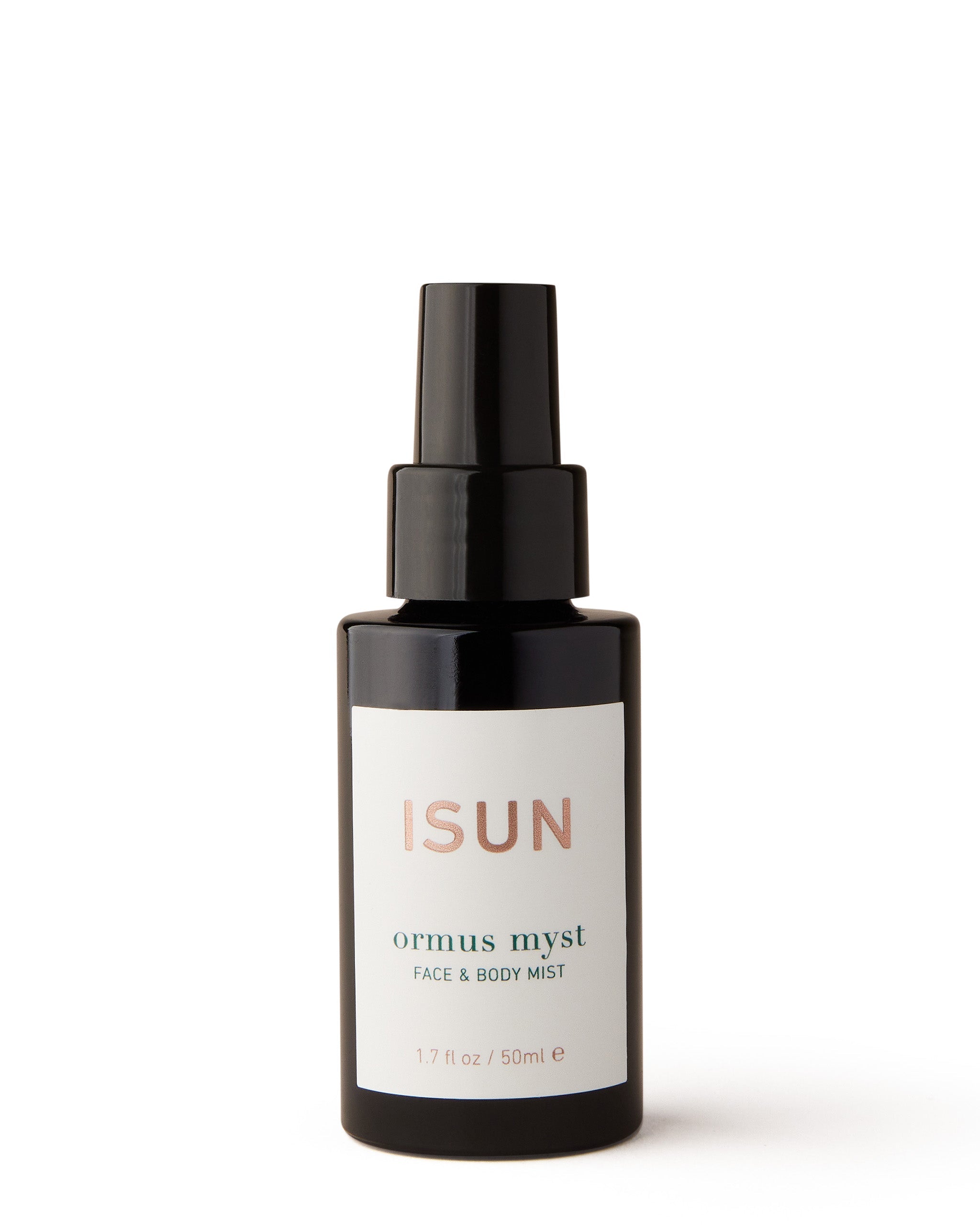 A black spray bottle labeled 'ISUN' with 'ORGASMIC MYST' written below, indicating a face and body mist containing rose, jasmine and sacred frankincense.