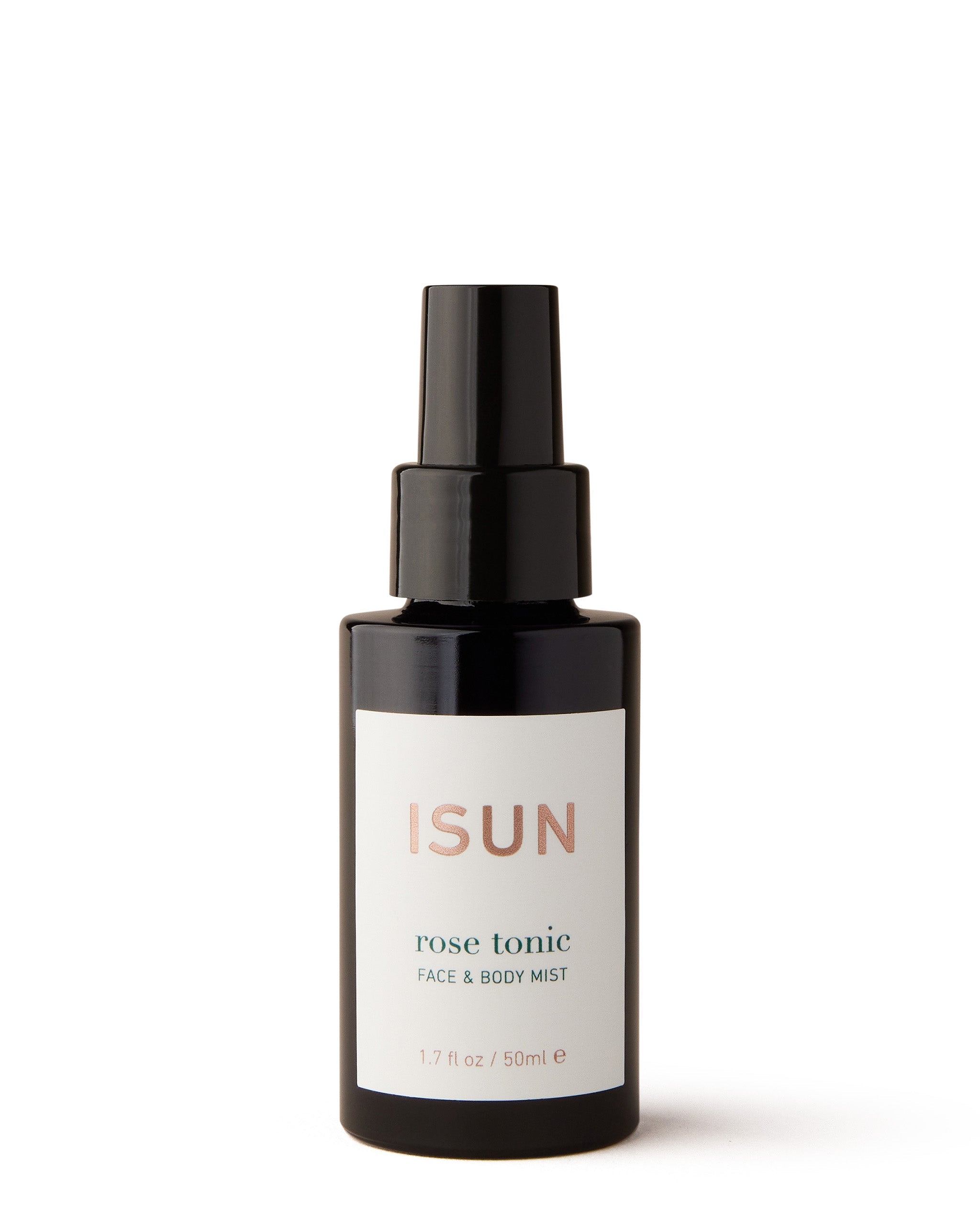 A bottle of Rose Tonic Face & Body Mist by ISUN Skincare with a black cap and label.