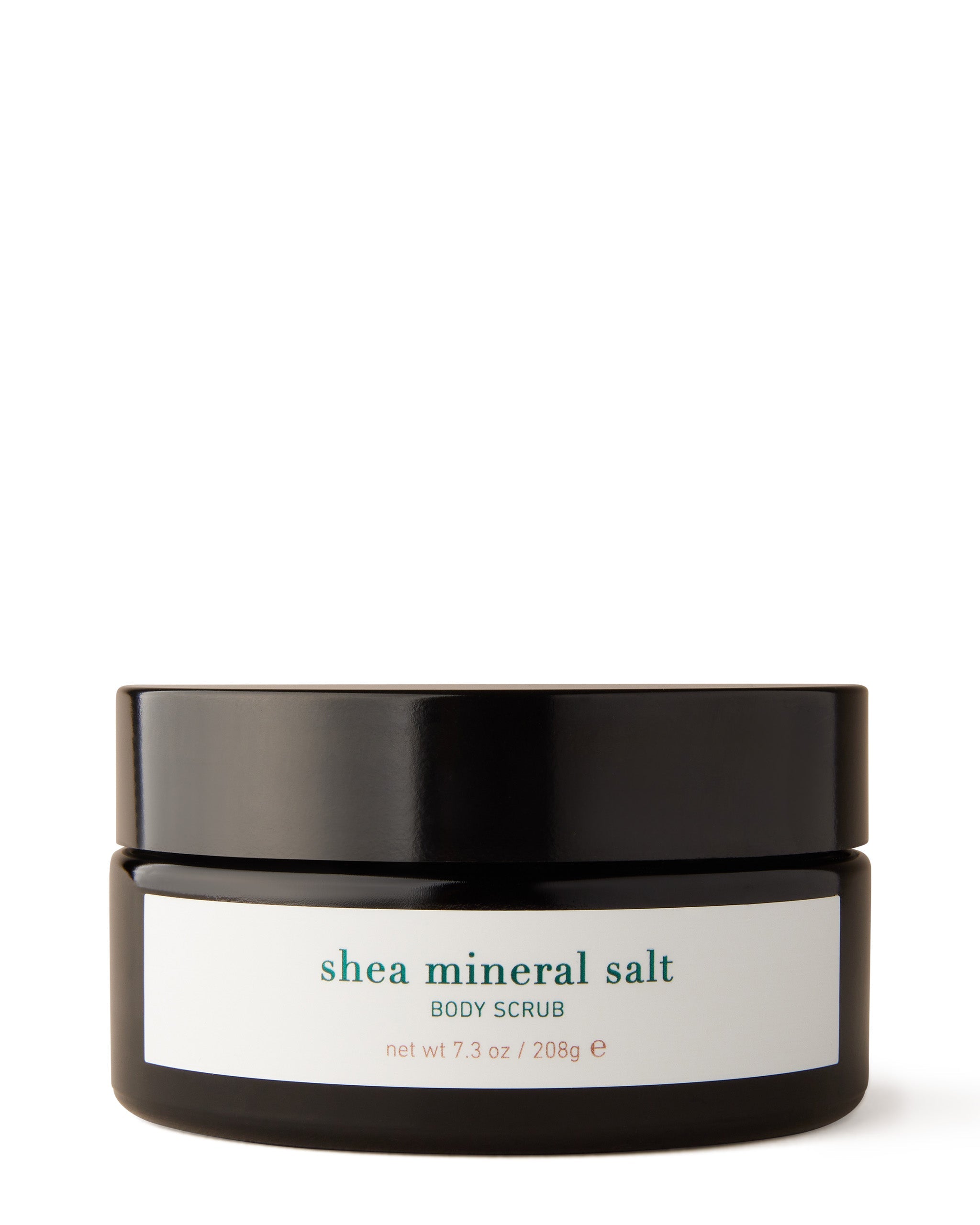 A jar of Shea Mineral Salt Nourishing Body Scrub with a label indicating the product name and net weight of 200 ml.