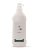 White bottle of ISUN coconut oil on a white background