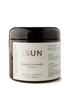 A black jar of ISUN Honey-Avocado Body Mask with a white label displaying product details.